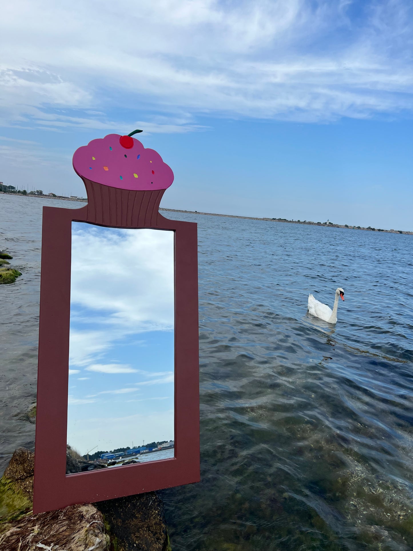 Oglindă în formă de brioșă